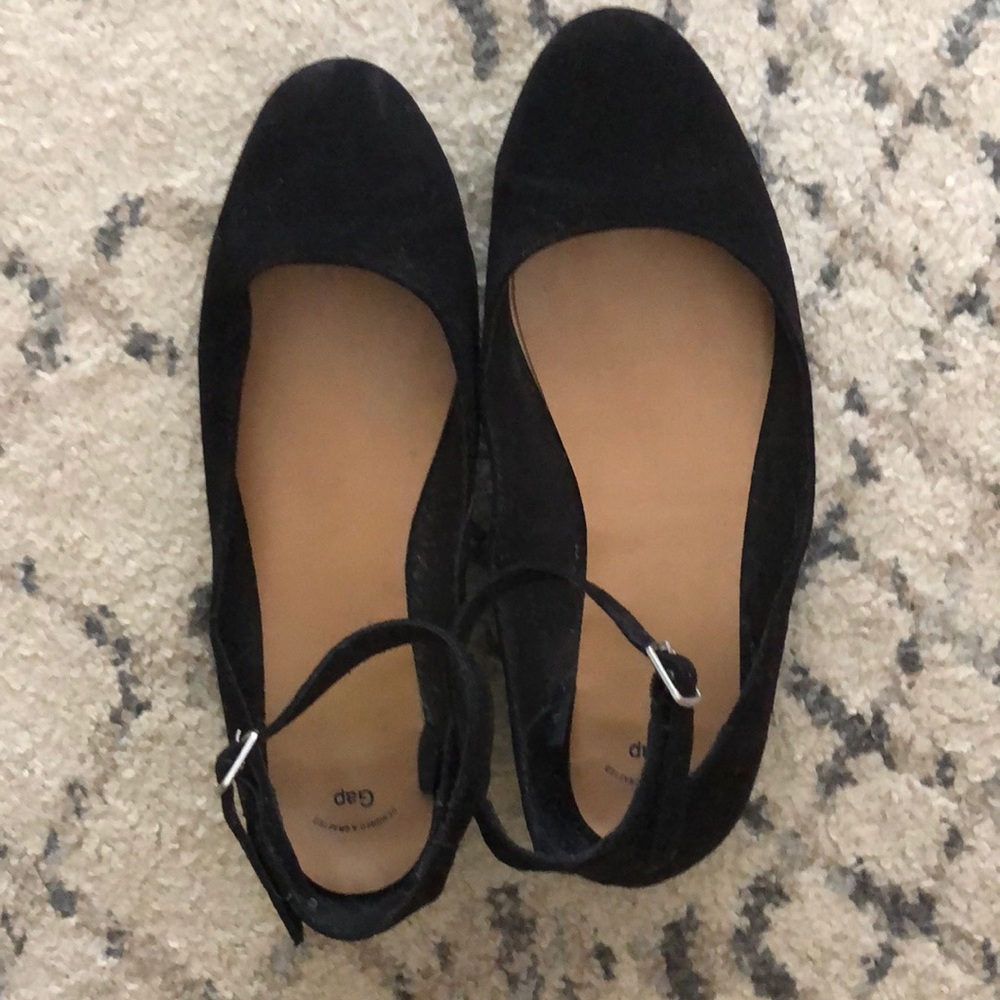 Black faux suede flats.